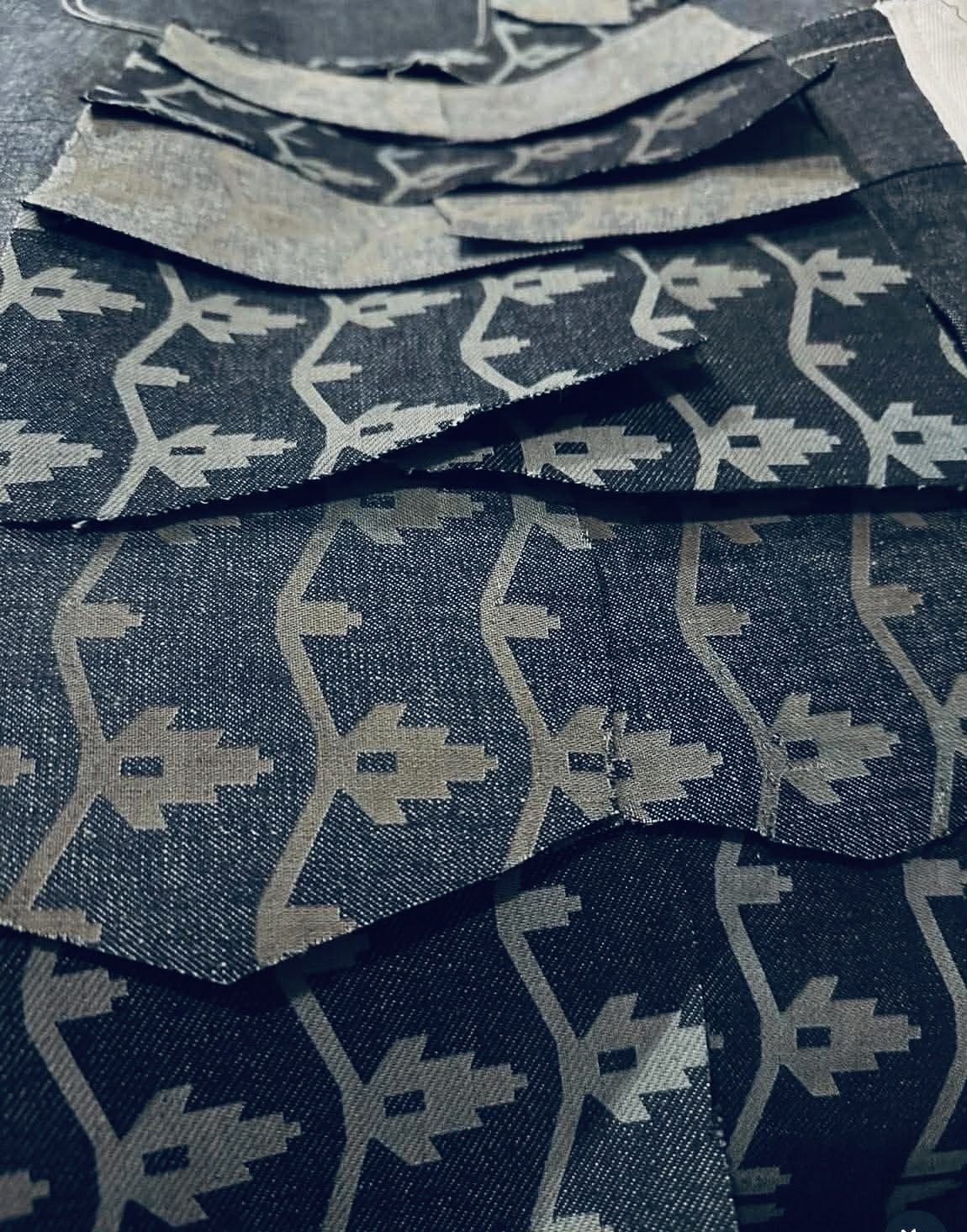 Close detail of patterned denim fabric from Tanvir Mahidy's collection