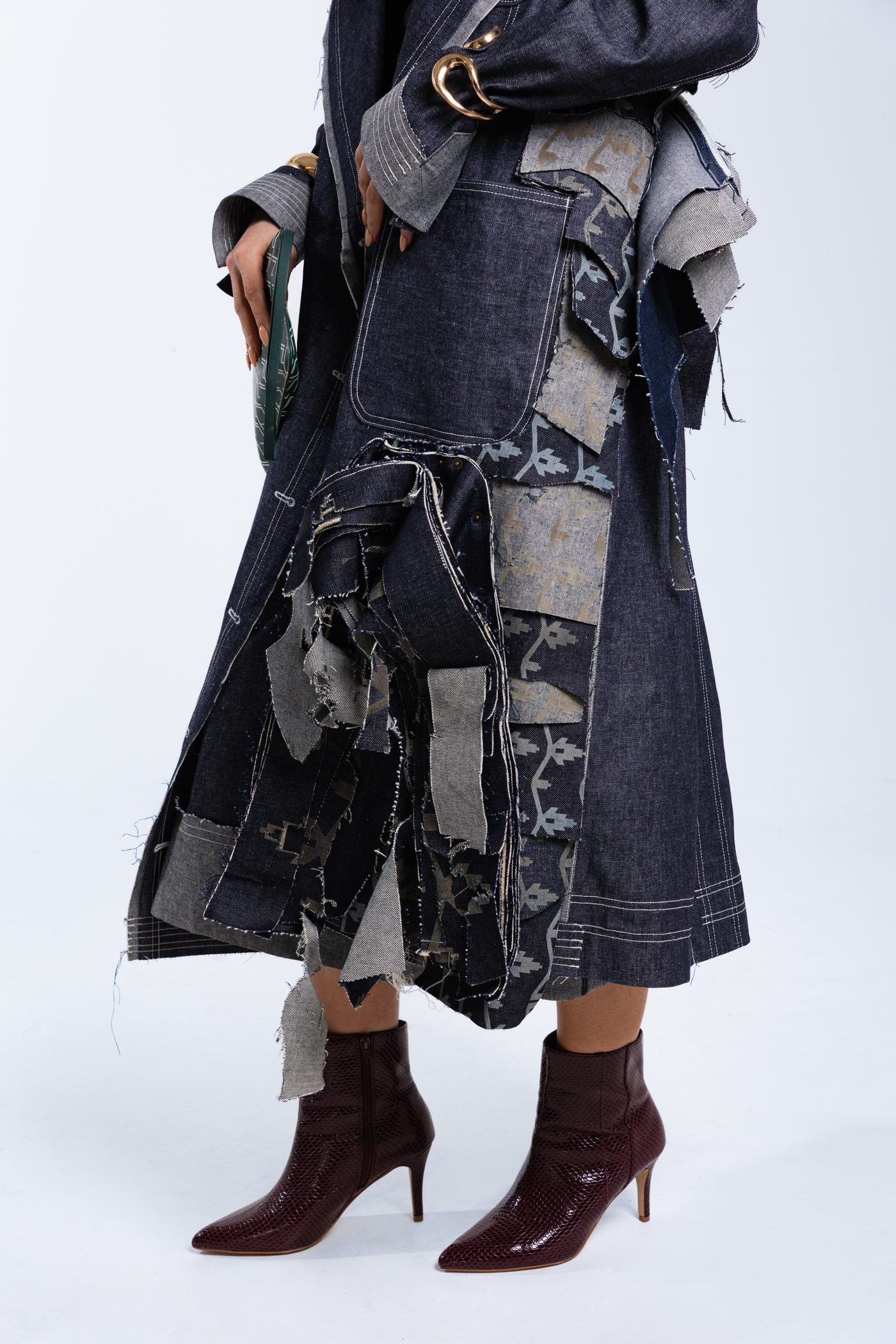 Patchwork denim construction detail